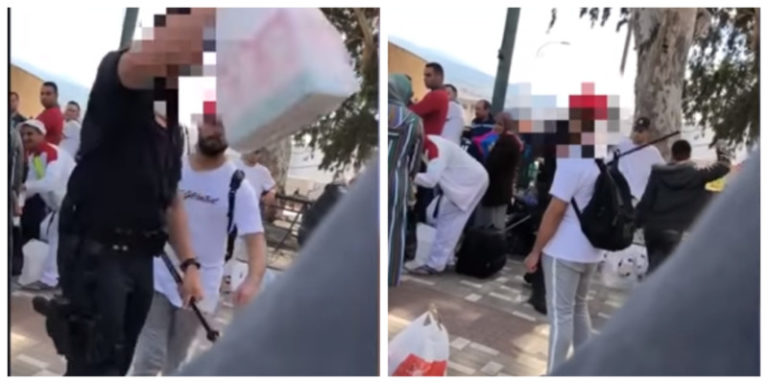 شرطي إسباني يهين مغاربة ويرمي بضائعهم في القمامة (فيديو)
