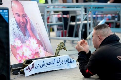 نشطاء يحتجون في ذكرى مقتل فكري